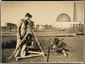 [New York World's Fair. Surveyors in transportation area. Construction view.(With the Trylon and Perisphere in the background.).]