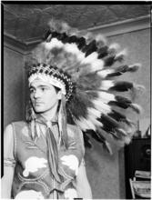 [Man wearing headdress.]