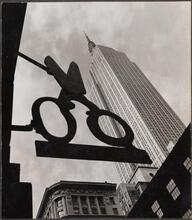 [Looking up at the Empire State Building.]
