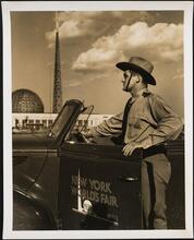 [New York World's Fair. Motor police officer (With the Trylon and Perisphere in the background.).]