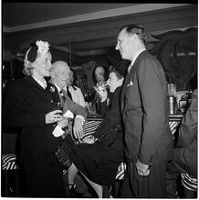 Champagne Cholly Book Party [Group of people talking.]