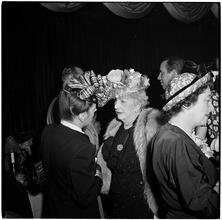 Champagne Cholly Book Party [Two women talking.]