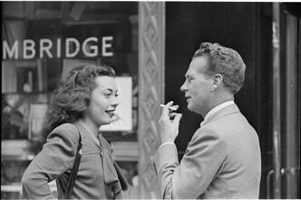 Street Conversations [Man and woman talking on the street.]