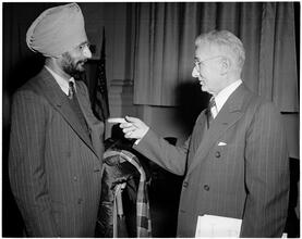 Dale Carnegie [Dale Carnegie speaking with S. S. Jaaj, a student.]