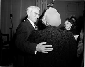 Dale Carnegie [Dale Carnegie talking to a woman.]