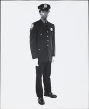[Policeman in uniform.]