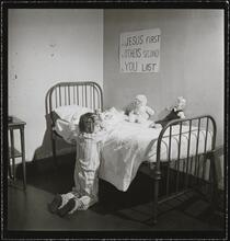 Orphanage [Girl praying.]