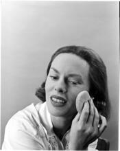 Fashion Models: Lisa Fonssagrives [Meg Mundy applying face powder.]