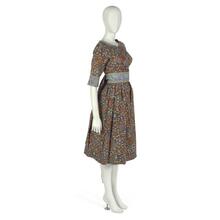 Dress in blue and orange foliate boteh print on golden brown cotton voile ground