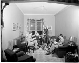 Fashion Models: Lisa Fonssagrives [Meg Mundy hosting a get-together at home.]