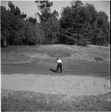 Arthur Godfrey [Godfrey playing golf.]