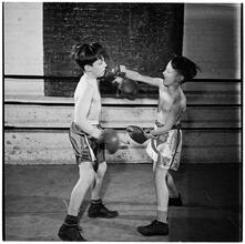 Boxing [at the] Police Athletic League [Two boys boxing.]