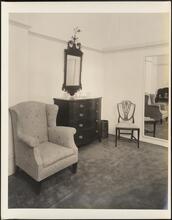 [Residence. Interior, with chair and bureau.]
