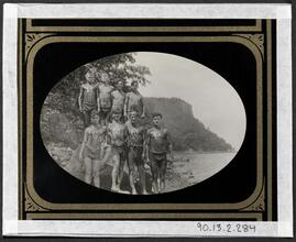 ["Riis Camp," Eight boys at lake.]