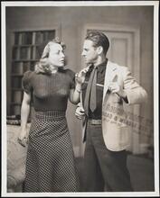 [Bernadine Hayes as Mazie Stoner and Roy Hargrave as Hal Wilson in "Blind Alley".]