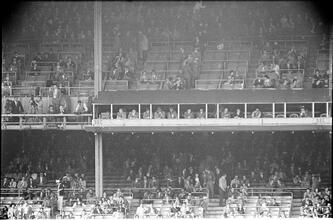 Football Writers [Fans in the stadium.]