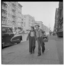 Shoe Shine Boy [Mickey and a friend walking down the sidewalk.]