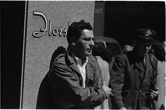 People Waiting [Candid shots of a man waiting in front of Florsheim Shoes.]