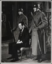 [The trial scene in "The Moon is Down".]