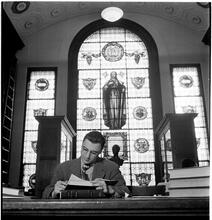 Columbia University [Student in a library.]