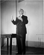 Dale Carnegie [Dale Carnegie teaching a class on public speaking.]