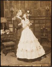 [Eugene O'Brien as Lt. Davis Graham and Molly McIntyre as Kitty McNab in "Kitty Mackay".]