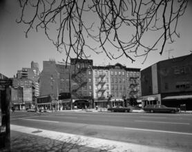 [Looking across Seventh Avenue South to the intersection of Bleecker and Barrow Streets.]