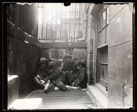 Street Arabs in sleeping quarters.
