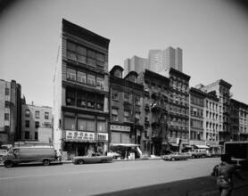 [Storefronts on East Broadway between Catherine and Market Streets.]