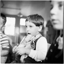 New York City Scenes: Fashion Shots [Portrait of a boy.]