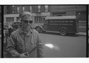 Paddy Wagon [Man with welding equipment used in the making of the television show Paddy Wagon.]