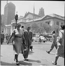 New York City Scenes: Fashion Shots [Woman walking down the street.]