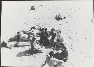 [Group of people relaxing on Coney Island beach.]