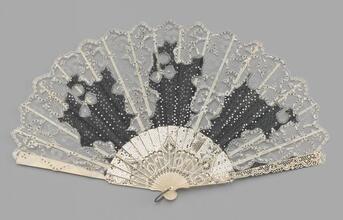 Folding fan of spangled black gauze leaf and machine lace insets