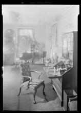 Carroll Carstairs [residence]. Living room secretary and piano.