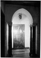 Michael E. Paterno [residence]. Entrance arch and door.