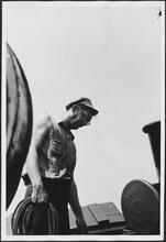 [Crew member on the ferry.]