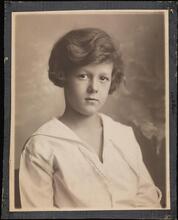 [Unidentified child in white sailor-style shirt.]