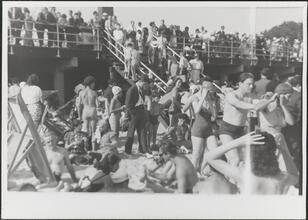 [Crowd on Coney Island beach and boardwalk.]