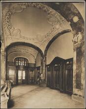 [Interior, elevator lobby.]