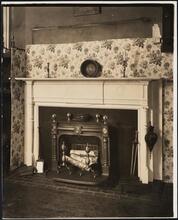 [Interior, showroom, detail of mantel.]