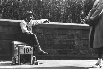Untitled [Shoe-shine man at rest, Union Square]
