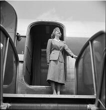 Fashion - Men [Fashion shoot, showing a flight attendant.]