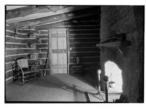 West side Y.M.C.A. Log cabin to door.