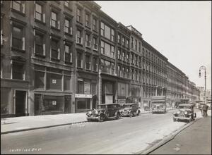 [South side of 50th Street, looking west from 5th Avenue.]