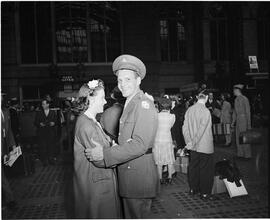 Penn Station [Soldier reuniting with woman.]