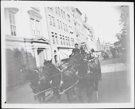 [Horse-drawn fire engine.]