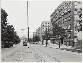 [Streetcar and apartment.]