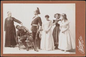 ["The Conquerors" theater still.]
