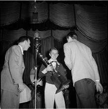 Swing Band Contest Sponsored by LOOK [Boy holding a trophy.]